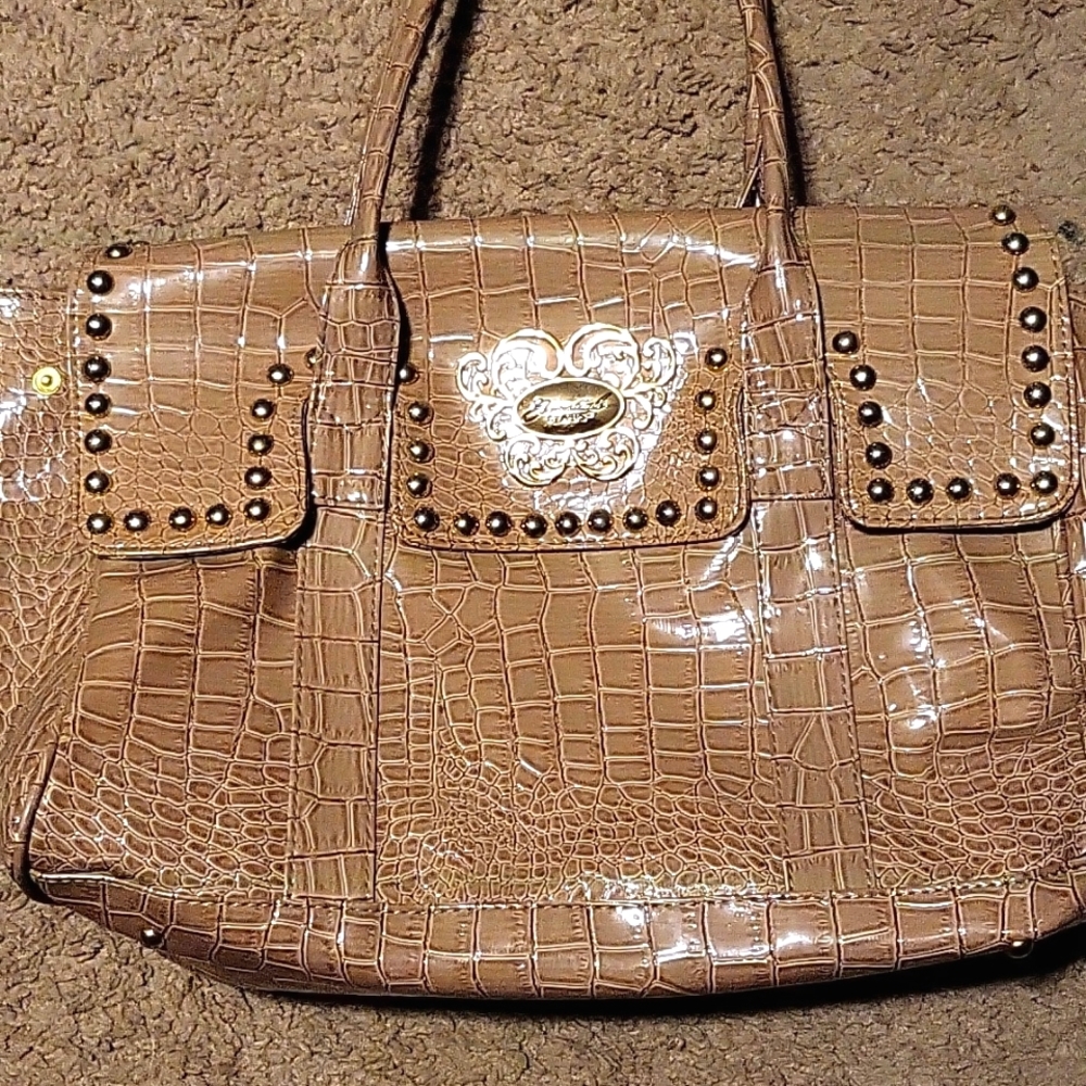 Tan and gold purse